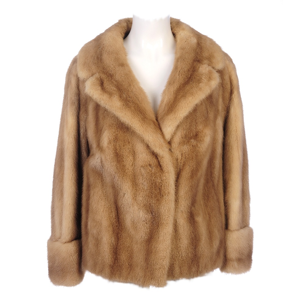 A pastel mink jacket. Designed with a notched lapel collar, hook and eye fastenings, wide sleeves