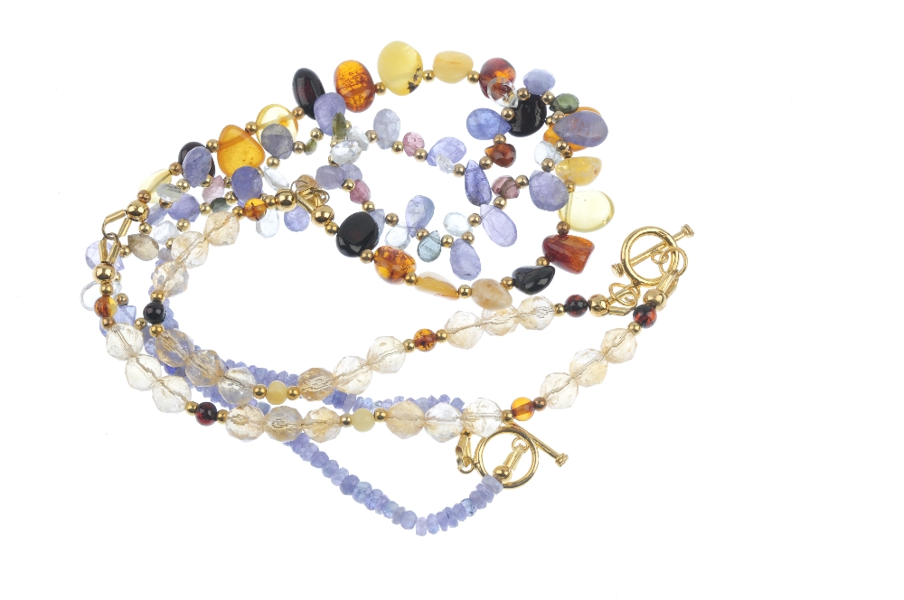 A tanzanite and multi-gem necklace and a natural and reconstructed amber and citrine necklace. The - Image 2 of 2
