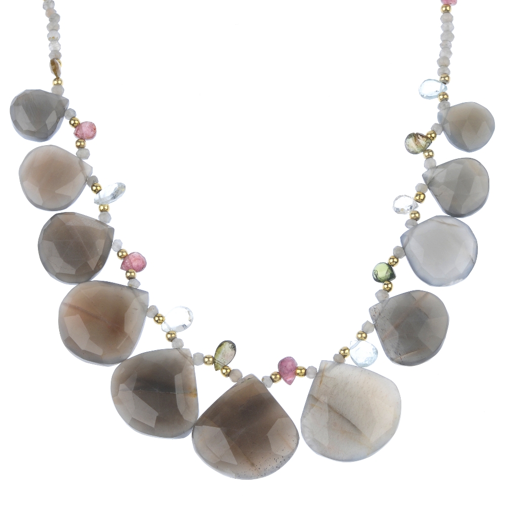 A sunstone necklace and a moonstone necklace. The first with small moonstone bouton-shape beads