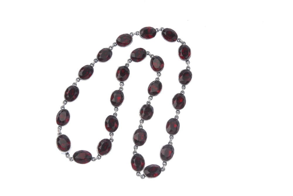 A paste necklace. Designed as a series of oval-shape red paste collets, to the similarly-designed - Image 4 of 4