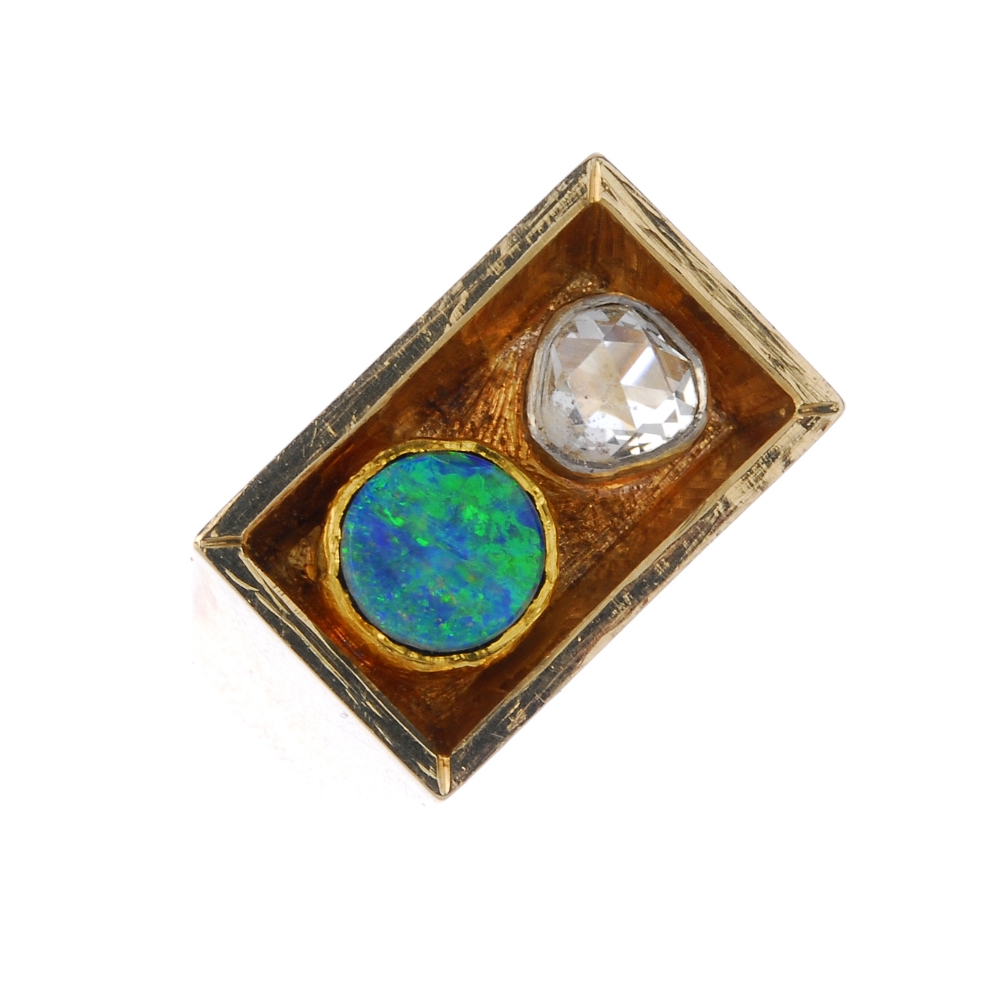A Scandinavian opal and diamond ring. Designed as a rectangular panel with a circular-cut opal