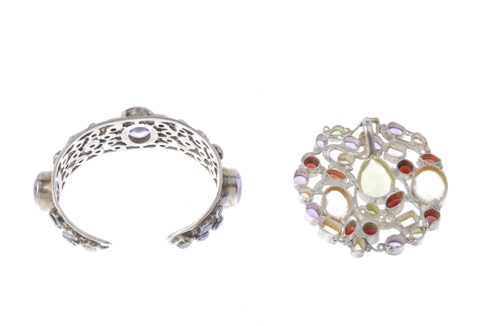 A gem-set bangle and pendant. The bangle with collet-set amethyst, peridot, smoky quartz and - Image 2 of 2