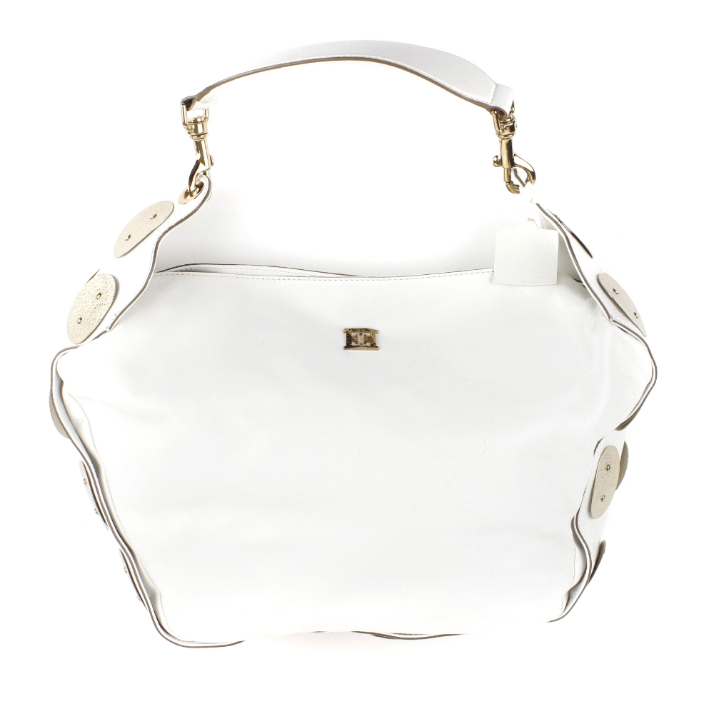 ESCADA - a white leather tote with metal trim. The white leather with gold-tone, oval, hammered