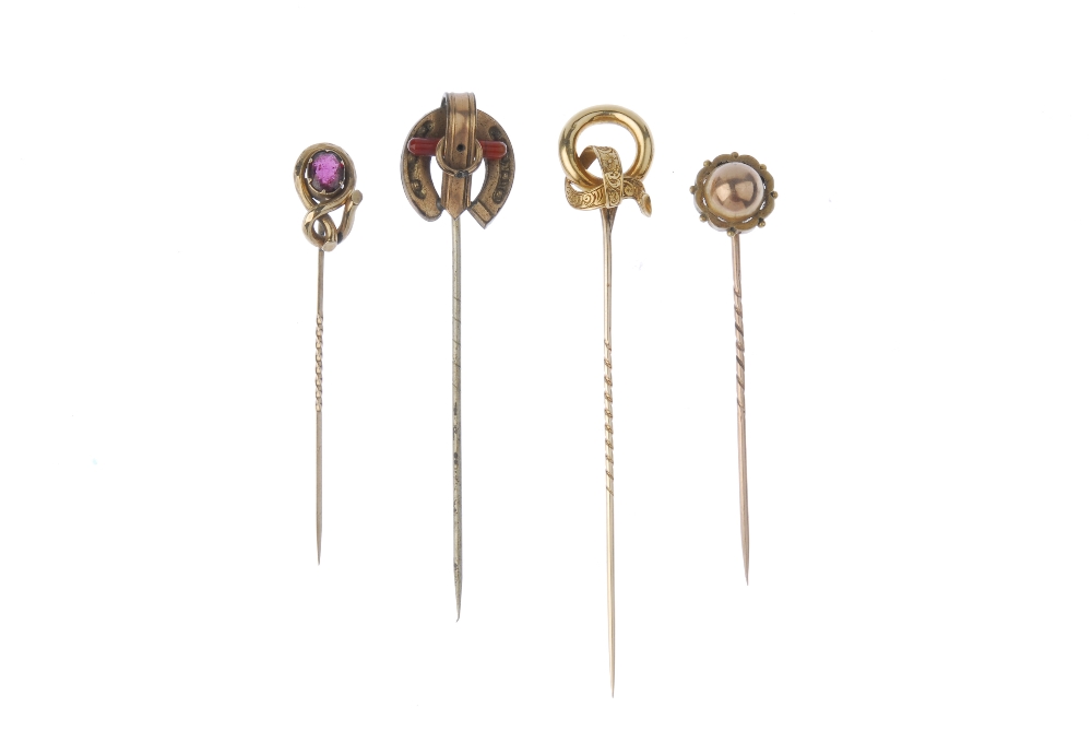 A selection of four stickpins. To include one designed as a horseshoe with buckle detail through its - Image 2 of 2