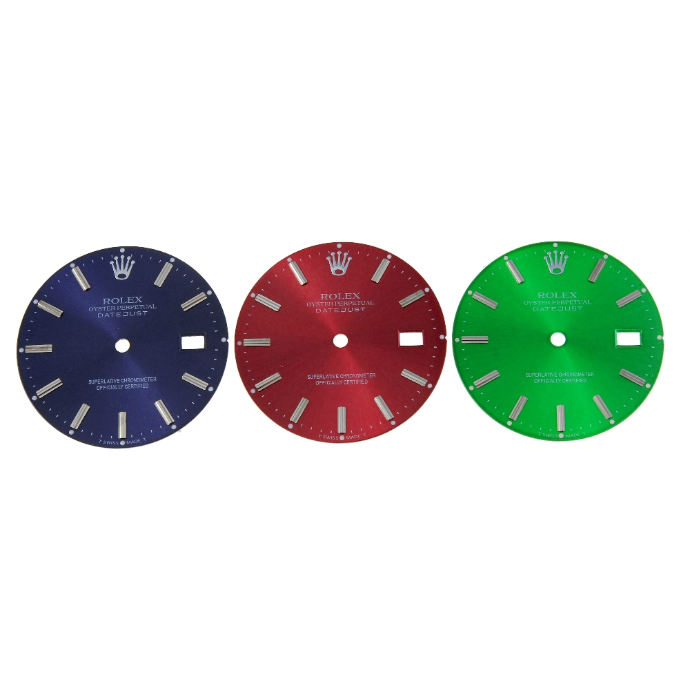 A group of dials in the style of Rolex. To contain red, green and blue examples, some diamond set,