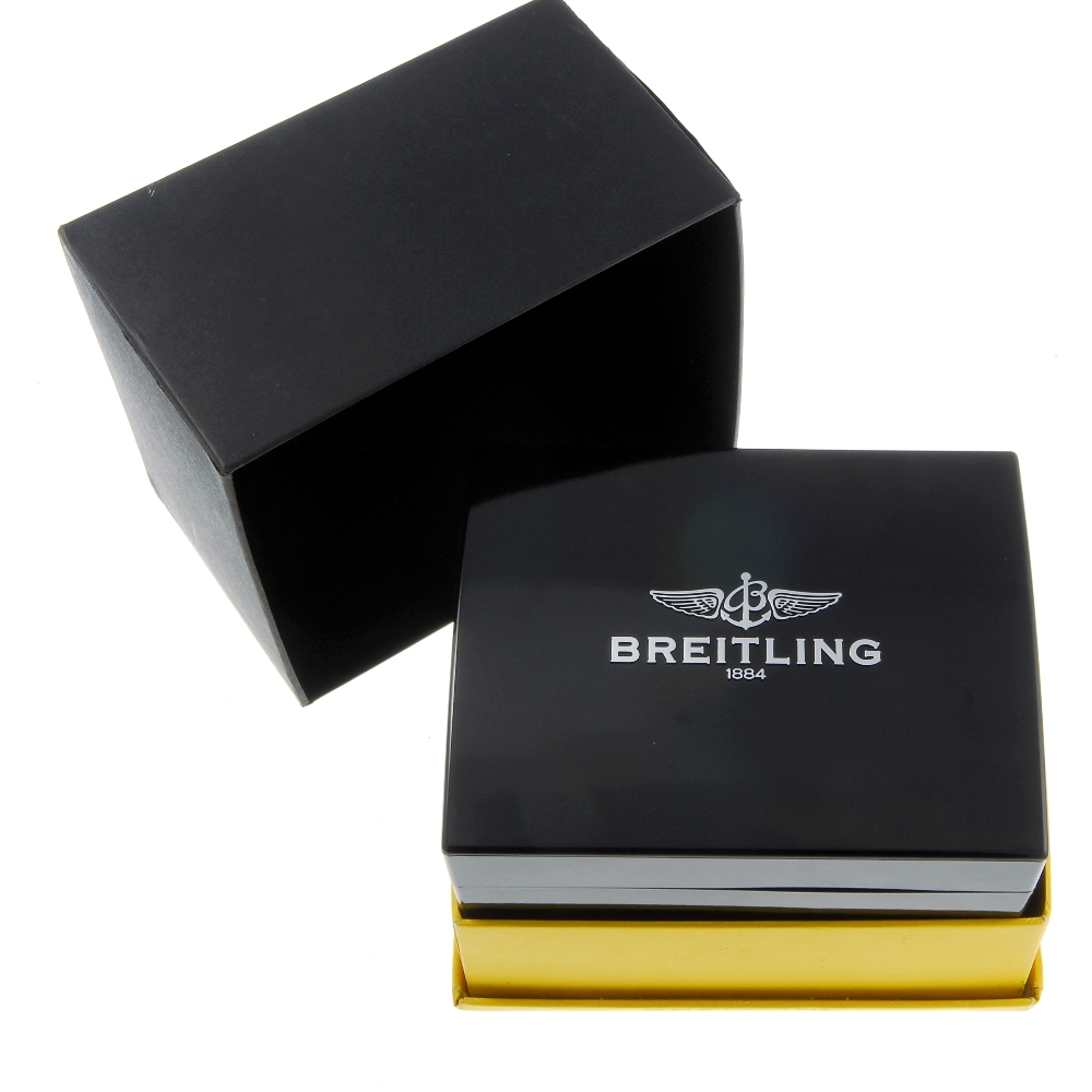 BREITLING - a complete watch box. Inner box is in a clean condition with minor marks to the