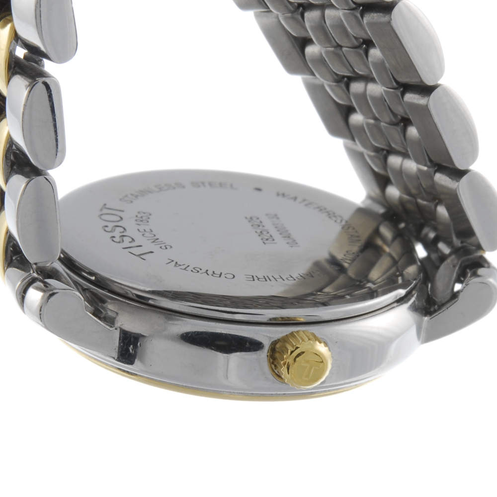 TISSOT - a lady's bracelet watch. Stainless steel case with gold plated bezel. Reference T825/925, - Image 2 of 4