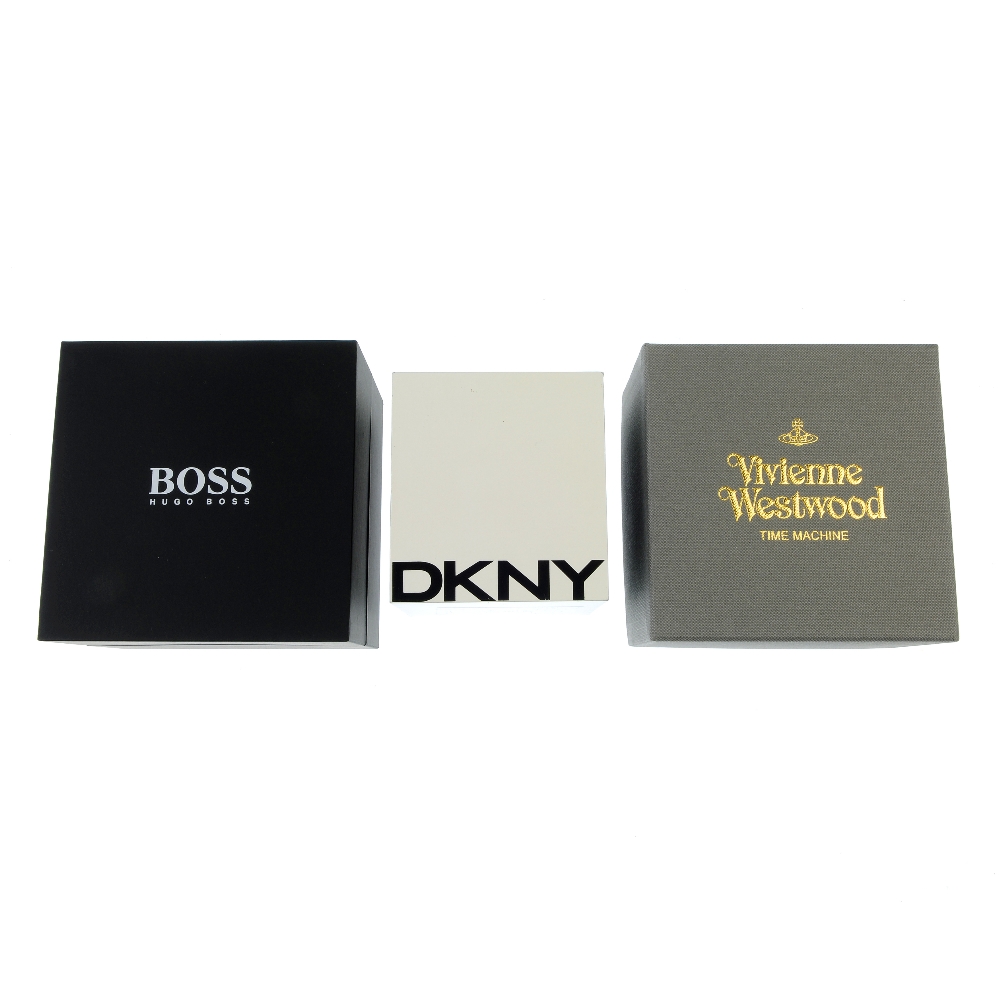A selection of watch boxes, including examples by Vivienne Westwood, Hugo Boss, DKNY etc.  Due to