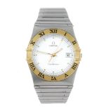 OMEGA - a gentleman's Constellation bracelet watch. Stainless steel case with yellow metal chapter