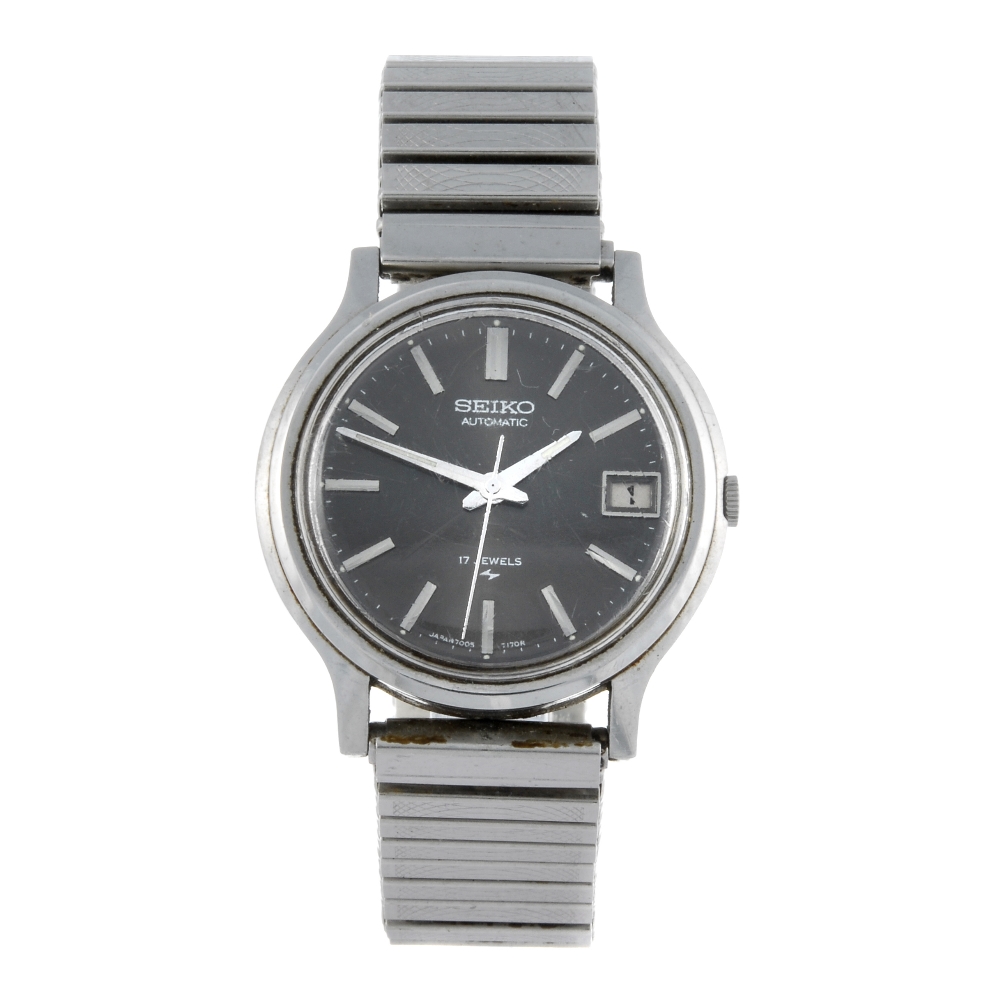 A group of eight watches, to include an example by Seiko and Cyma. All recommended for spare or
