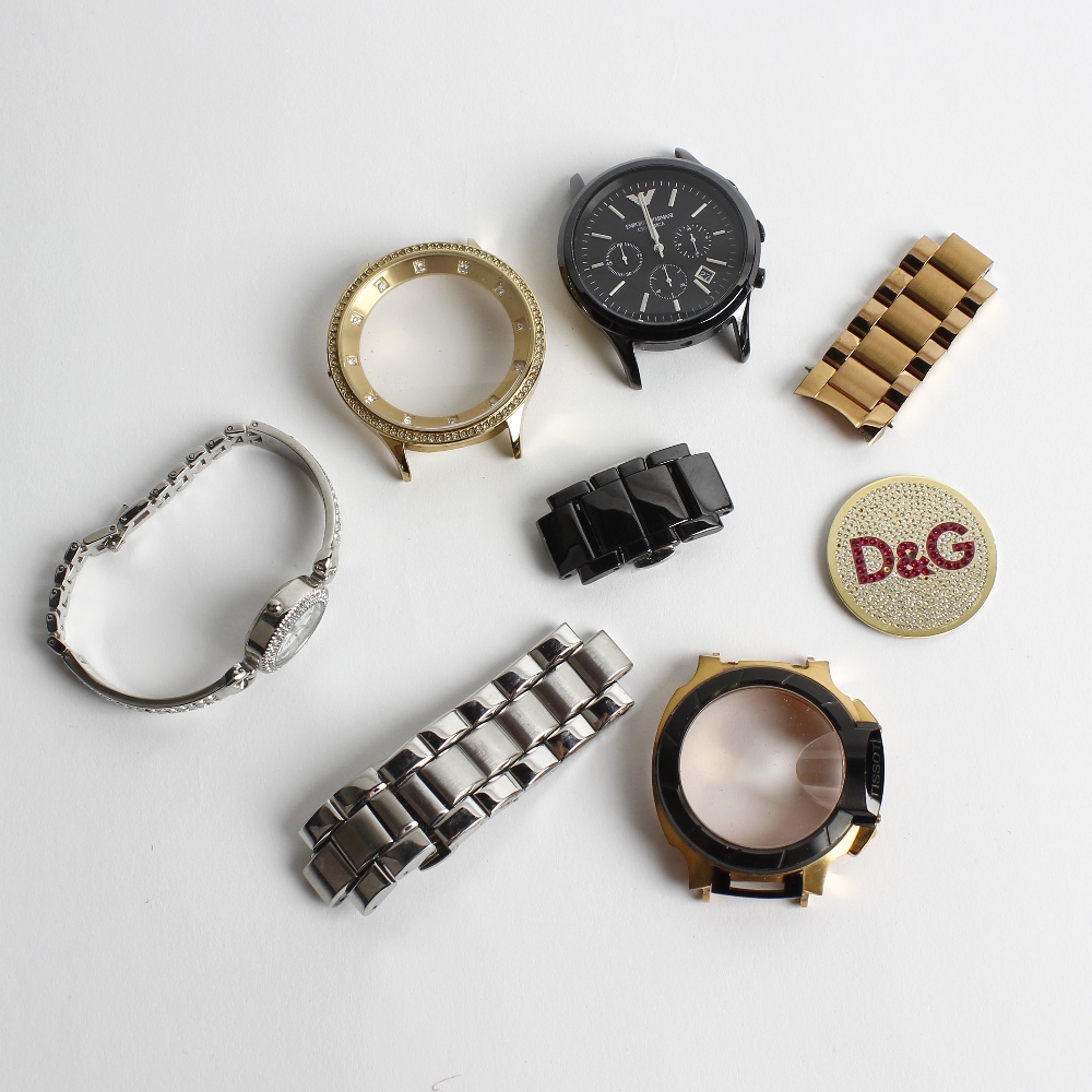 A quantity of watch parts and broken watches, predominantly by Emporio Armani. All recommended for