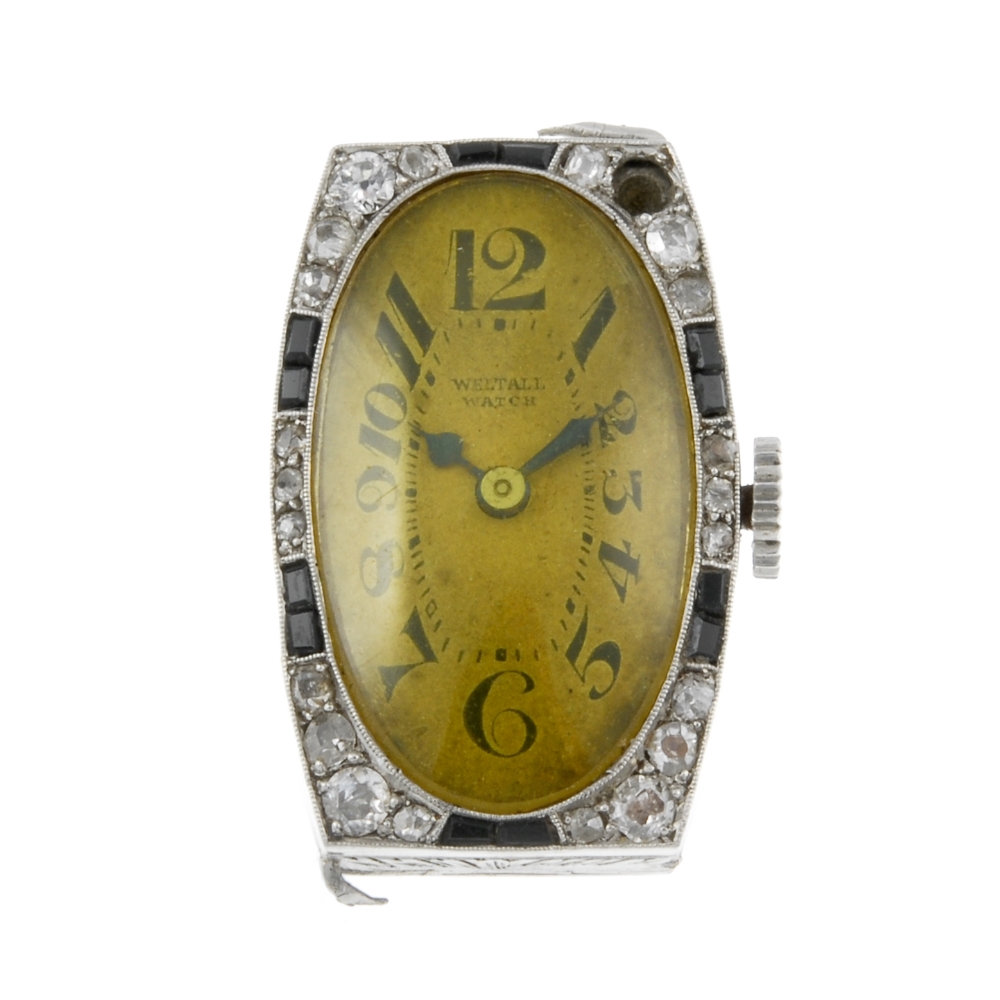 WELTALL - a lady's cocktail watch head. White metal case with diamond set bezel. Signed manual