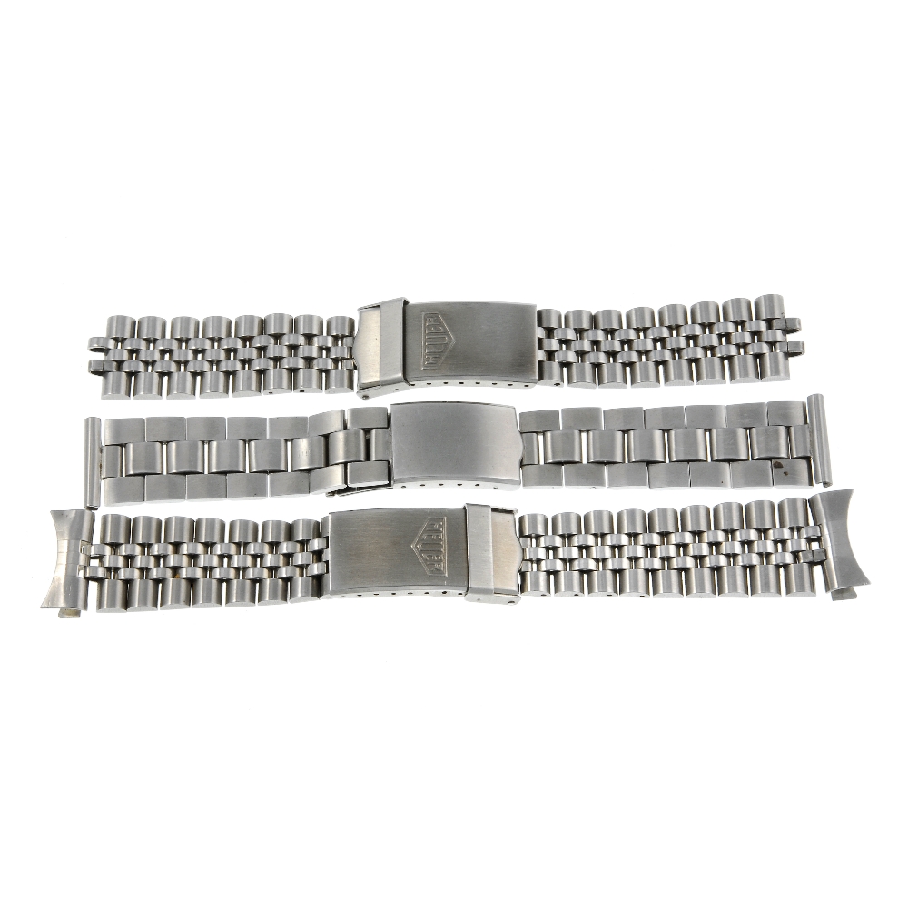 HEUER - a pair of stainless steel watch bracelets. Together with an Excalibur watch bracelet.