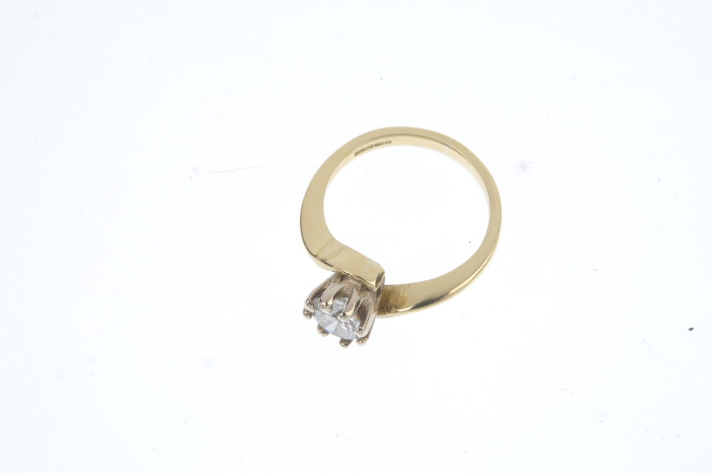 A diamond single-stone ring. The brilliant-cut diamond, to the crossover band. Estimated diamond - Image 2 of 3