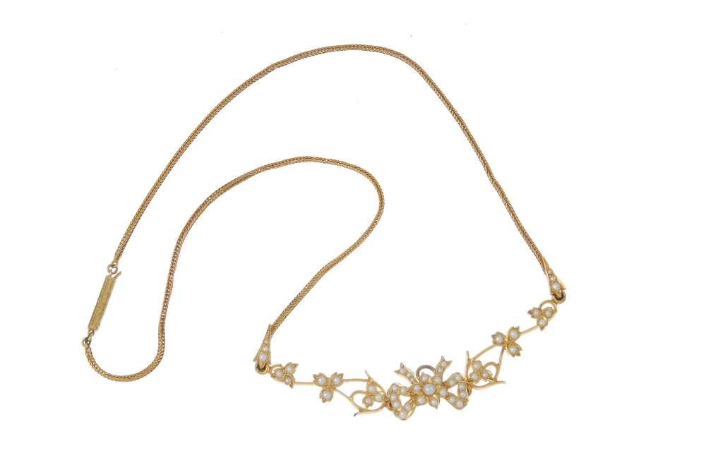 An early 20th century gold seed pearl floral necklace. Of openwork design, the seed and split - Image 4 of 6