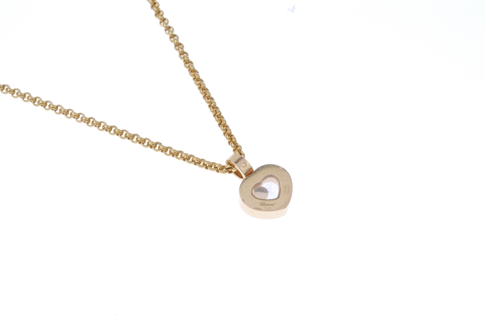 CHOPARD - an 18ct gold 'Happy Diamonds' pendant. The free-moving brilliant-cut diamond collet, - Image 2 of 4