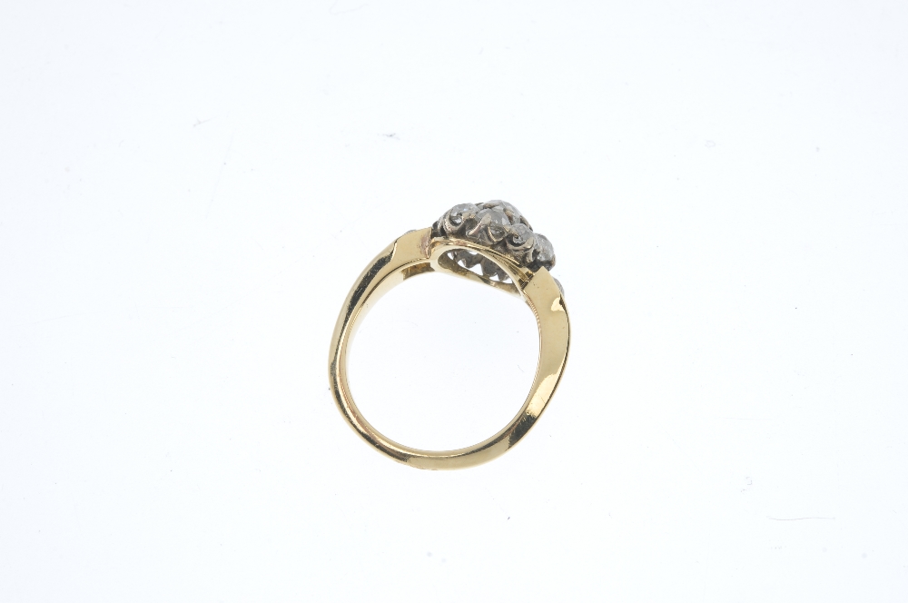 A mid 20th century gold diamond cluster ring. The old-cut diamond cluster, to the similarly-cut - Image 3 of 3