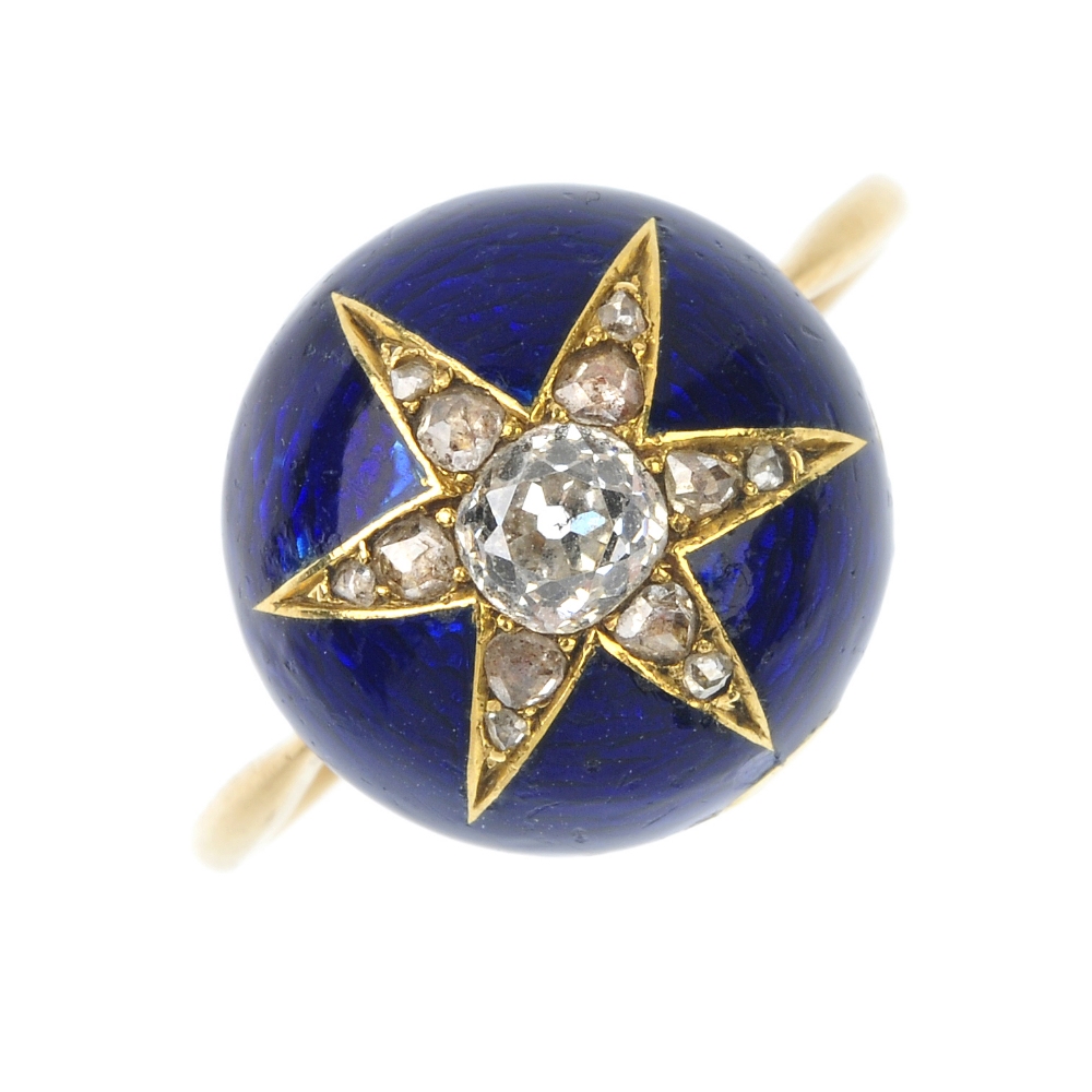 An 18ct gold diamond and enamel star ring. The late 19th century gold old and rose-cut diamond
