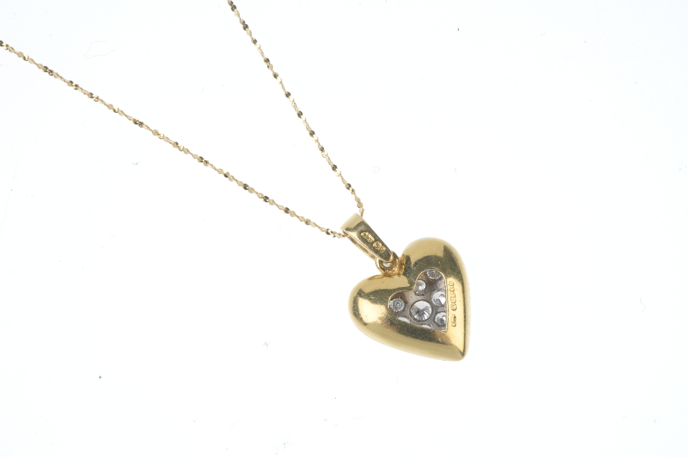 An 18ct gold diamond pendant. The pave-set brilliant-cut diamond heart, to the similarly-cut diamond - Image 2 of 3