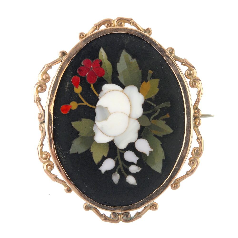 A Pietra Dura brooch and matching ear pendants. The brooch depicting a floral motif, to the black