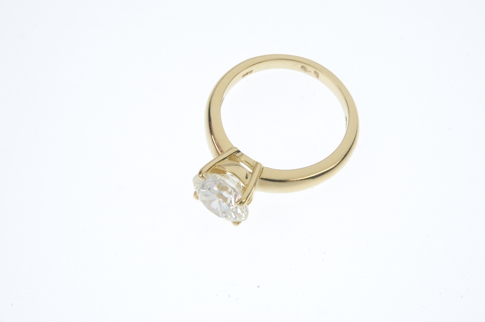 An 18ct gold diamond single-stone ring. The brilliant-cut diamond, weighing 3.44cts, to the - Image 2 of 4