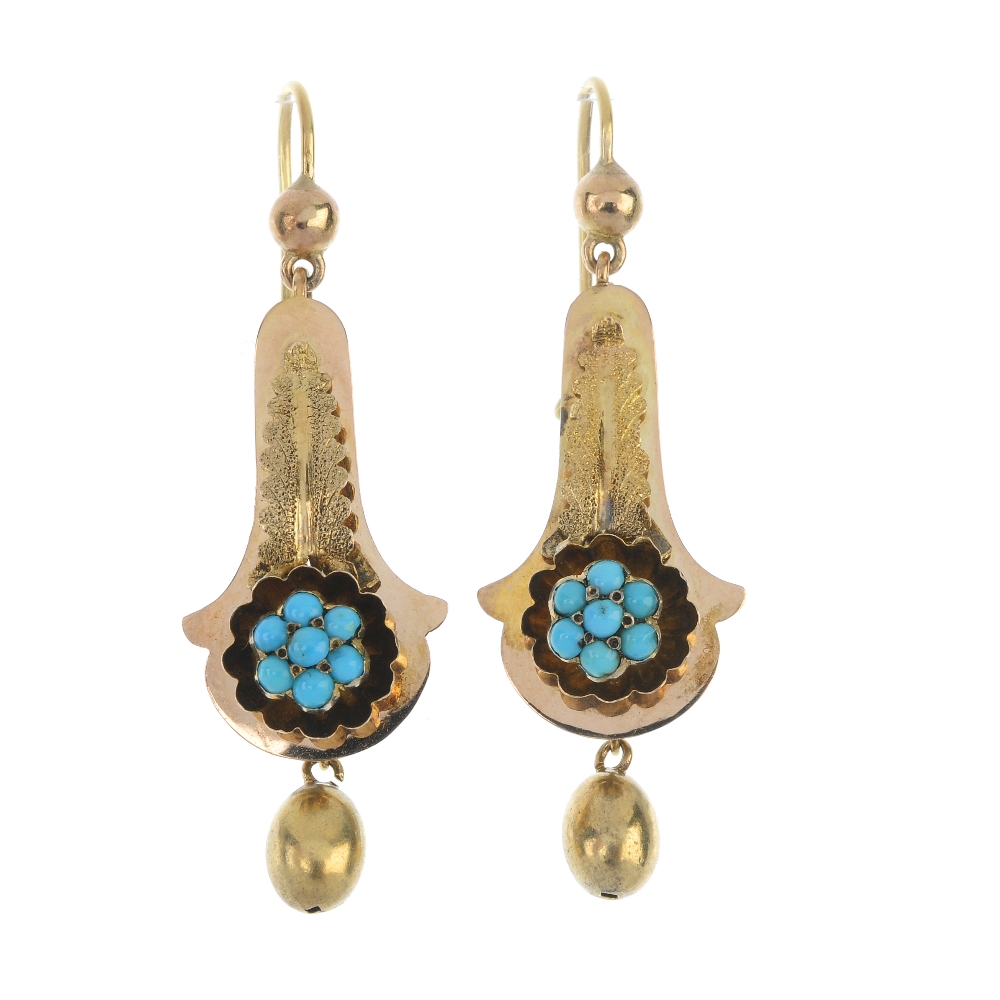 A pair of late 19th century gold turquoise ear pendants. Each designed as a turquoise cabochon