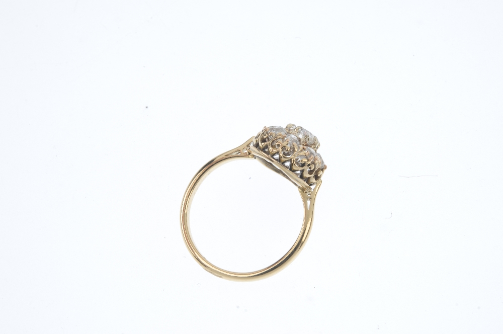 A mid 20th century 18ct gold diamond cluster ring. The old-cut diamond cluster, to the tapered - Image 3 of 3