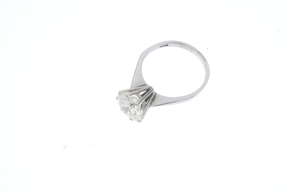 An 18ct gold diamond single-stone ring. The brilliant-cut diamond, to the tapered shoulders and - Image 2 of 5