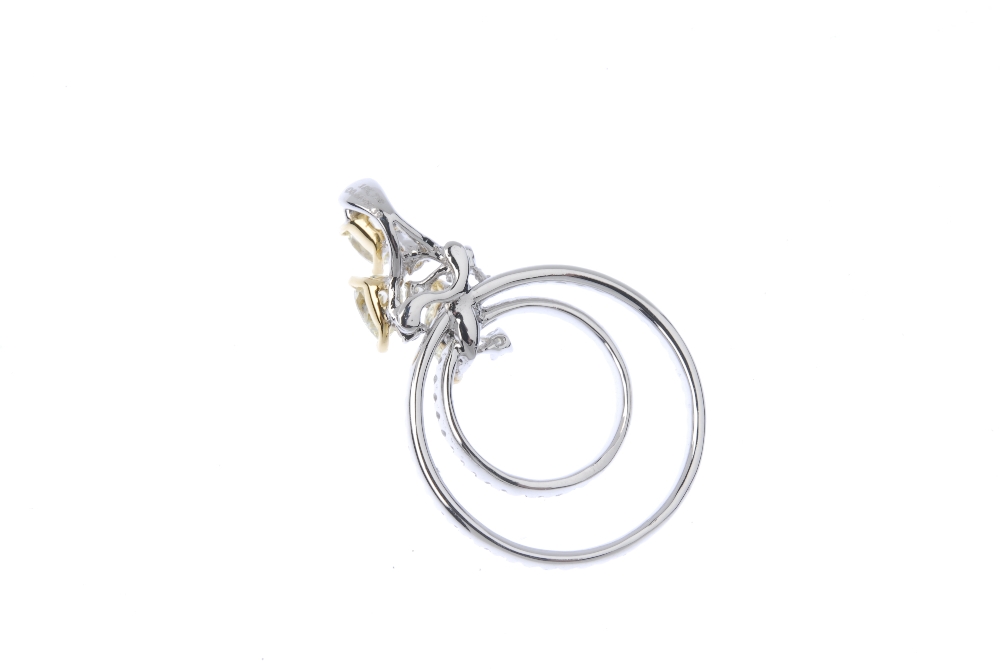 * A diamond and coloured diamond pendant. Designed as two brilliant-cut diamond concentric - Image 2 of 2