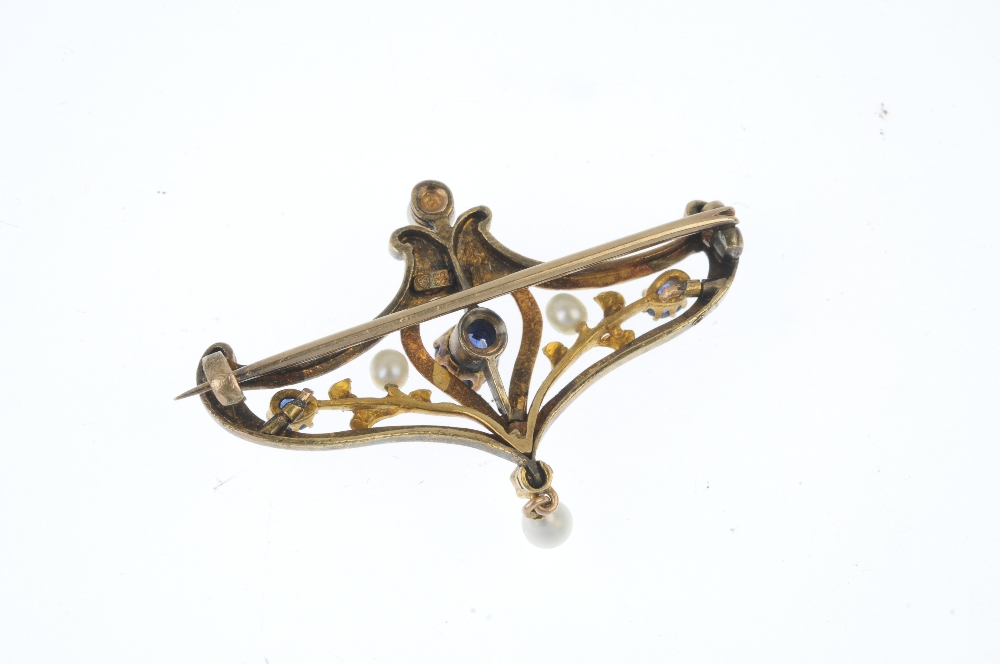 An early 20th century 14ct gold sapphire, diamond and seed pearl brooch. The circular-shape - Image 2 of 2