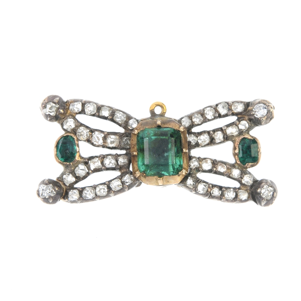A mid 19th century emerald and diamond jewellery component. The rectangular-shape emerald collet,