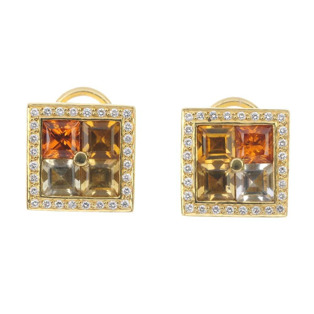 A pair of gem-set and diamond earrings. Each designed as square-shape citrine and yellow sapphire