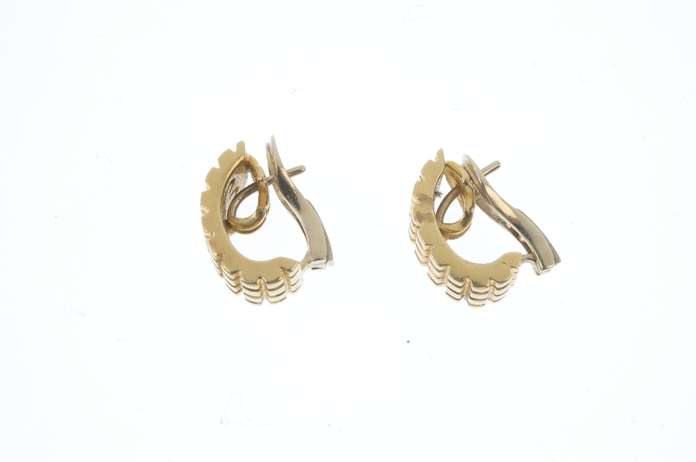 A pair of earrings. Each designed as a curved panel, with ridged decoration. Length 1.1cms. Weight - Image 2 of 2