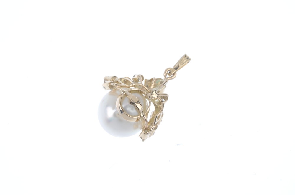 A cultured pearl, emerald and diamond pendant. The cultured pearl, measuring 13mms, with brilliant- - Image 2 of 2