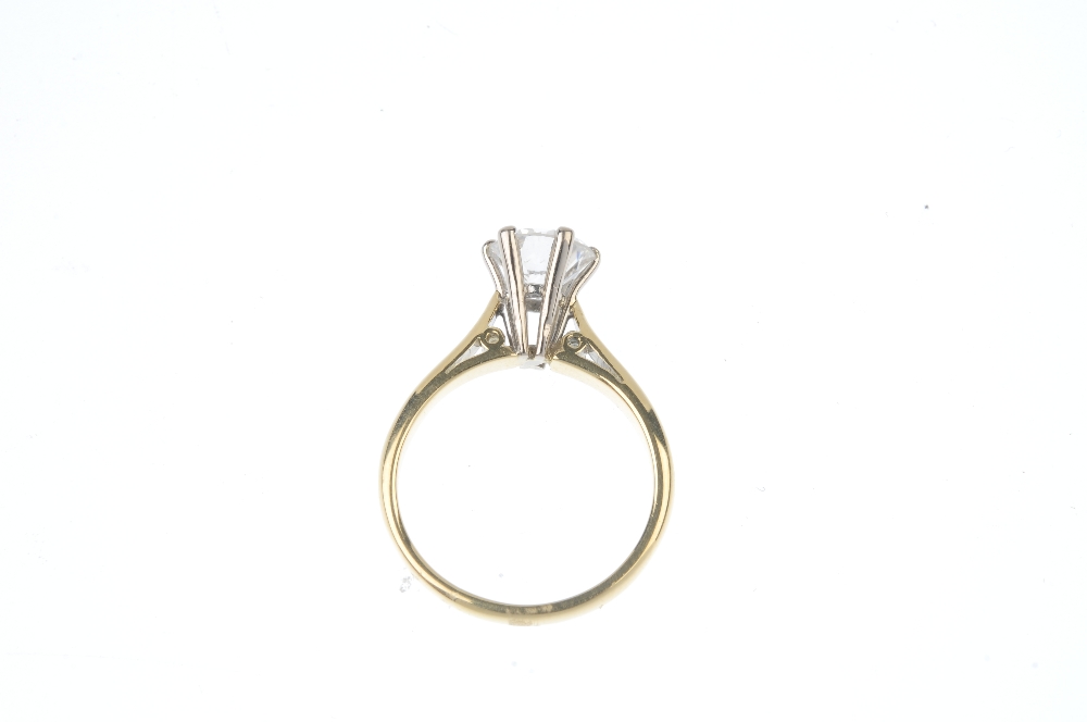 A diamond single-stone ring. The brilliant-cut diamond, to the tapered shoulders and plain band. - Image 3 of 5