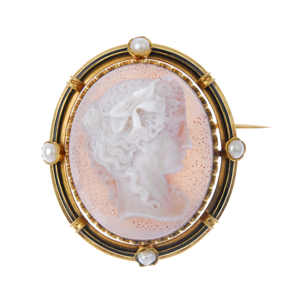 A late 19th century gold hardstone, split pearl and enamel cameo brooch. Carved to depict a