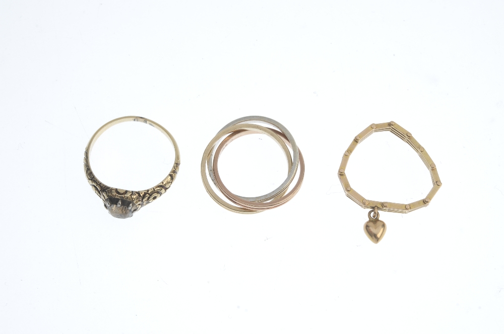 A selection of three dress rings. To include a mid 20th century miniature gate-link ring - Image 2 of 3