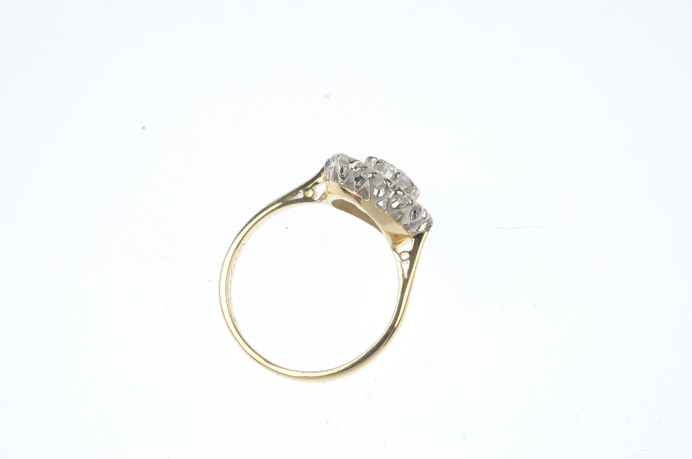 An 18ct gold diamond cluster ring. The brilliant-cut diamond, within a similarly-cut diamond - Image 3 of 3