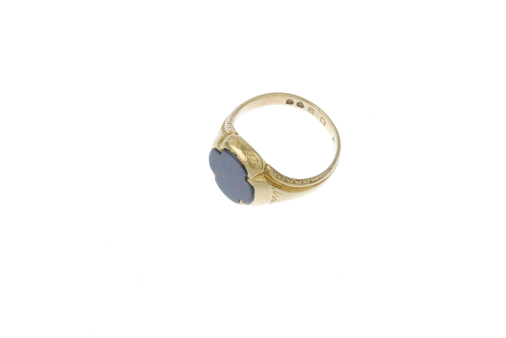 A gentleman's mid 19th century 18ct gold bloodstone signet ring. The scalloped edge bloodstone, to - Image 2 of 3