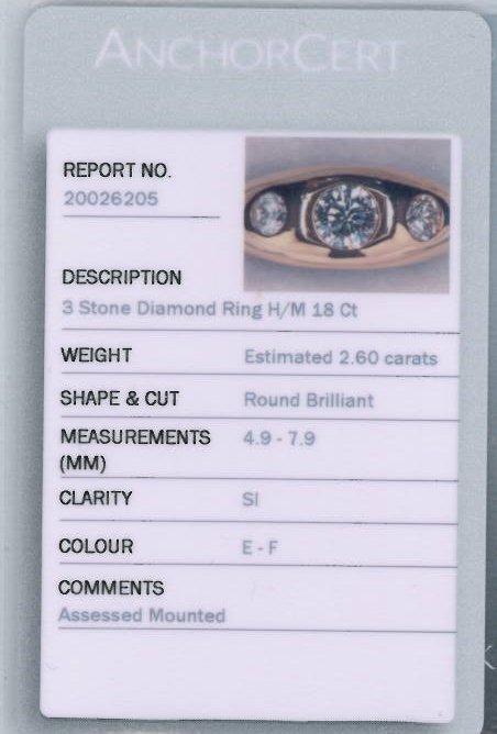 A gentleman's 18ct gold diamond three-stone ring. The brilliant-cut diamond graduated line, inset to - Image 4 of 4