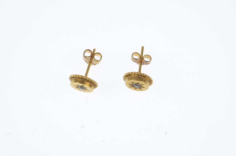 A pair of late 19th century diamond ear studs. Each designed as an old-cut diamond, within a star - Image 2 of 2