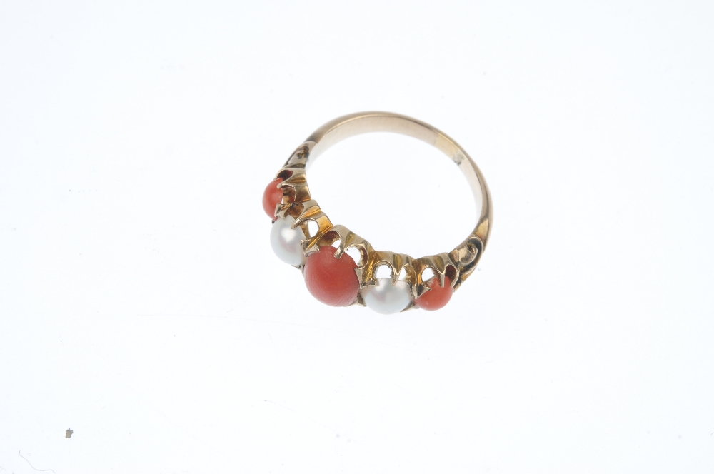 A coral and split pearl ring. The alternating graduated oval and circular coral cabochon and split - Image 2 of 3