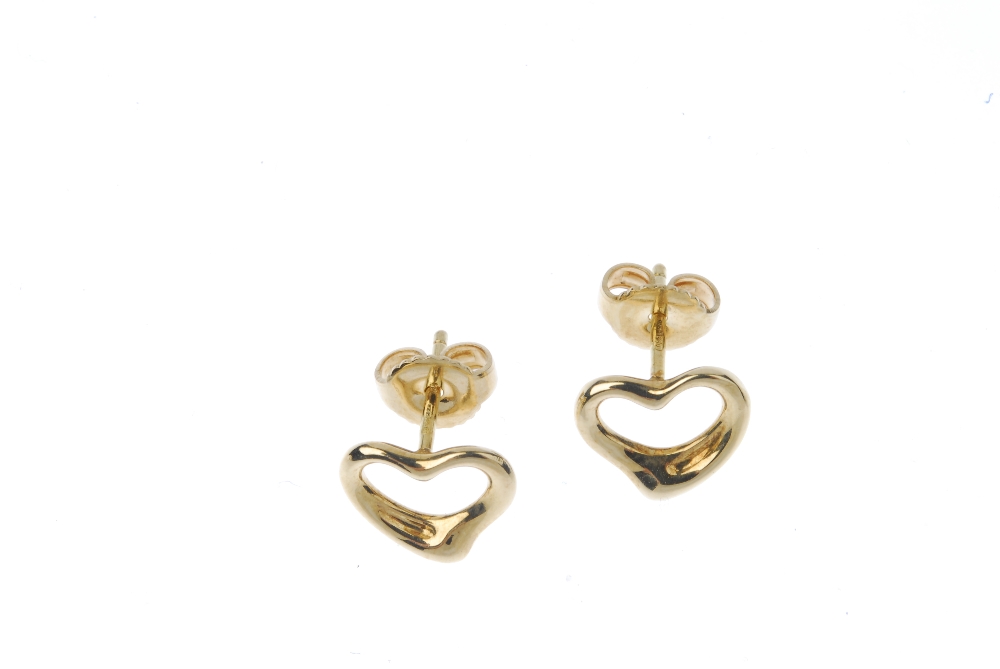 TIFFANY & CO. - a pair of 18ct gold 'open heart' earrings by Elsa Peretti for Tiffany & Co. Each - Image 2 of 2