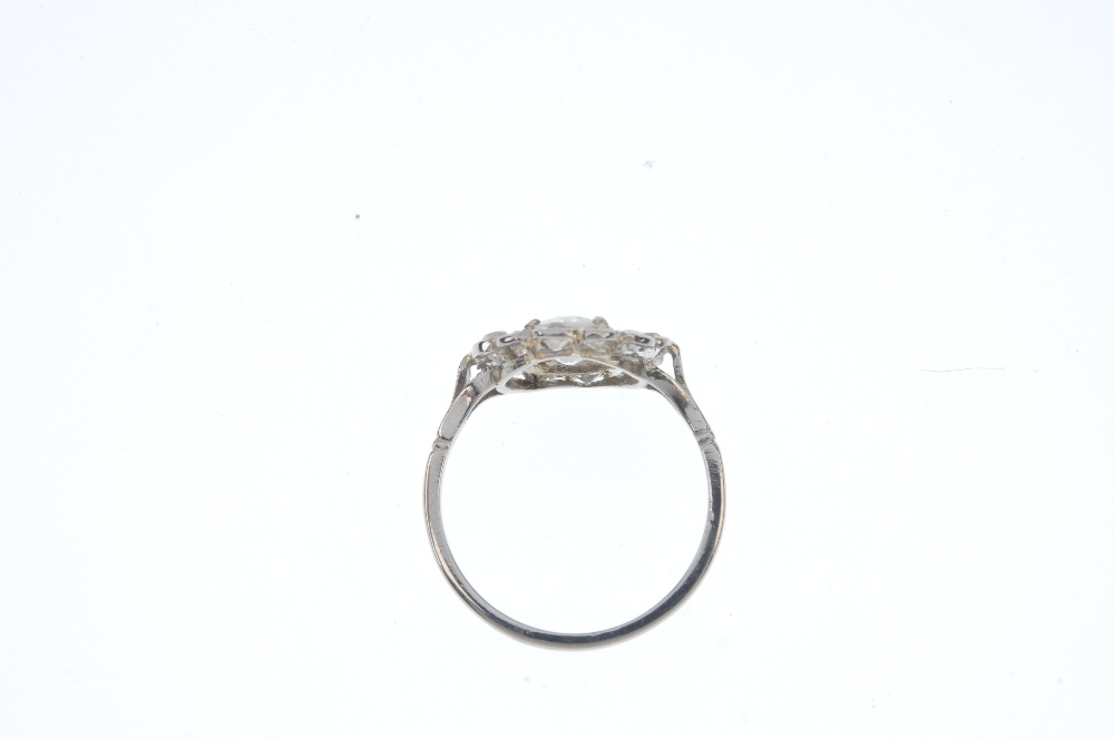 A mid 20th century diamond cluster ring. The old-cut diamond, within a similarly-cut diamond - Image 3 of 3