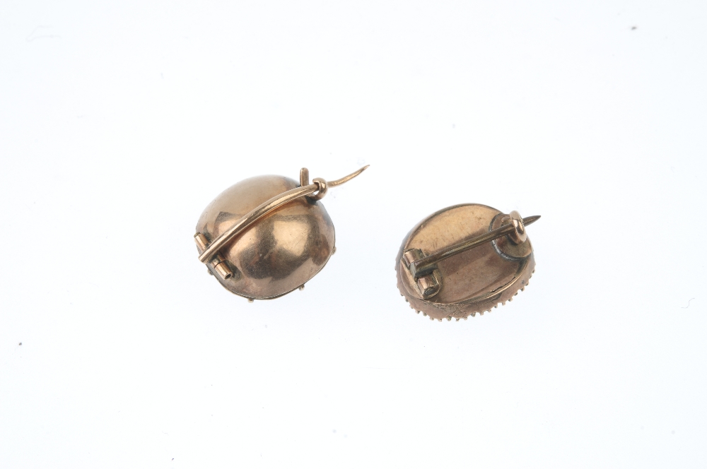 Two early to mid 19th century gem-set brooches. The first designed a a foil-back garnet and split - Image 2 of 2
