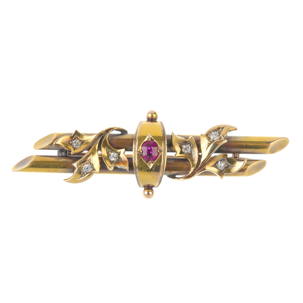 A late 19th century 15ct gold ruby and diamond brooch. The oval-shape ruby, within a curved panel,
