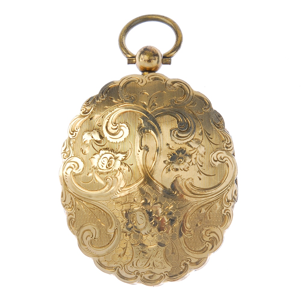 A late 19th century double sided locket. Of oval outline, engraved with scrolling floral motif,
