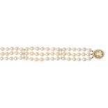 A cultured pearl and citrine bracelet. The cultured pearls, measuring 7mms, with two bar spacers, to