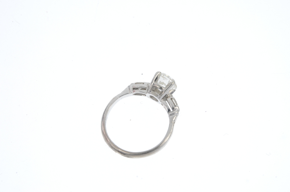 An 18ct gold diamond single-stone ring. The brilliant-cut diamond, to the marquise-shape diamond - Image 3 of 5