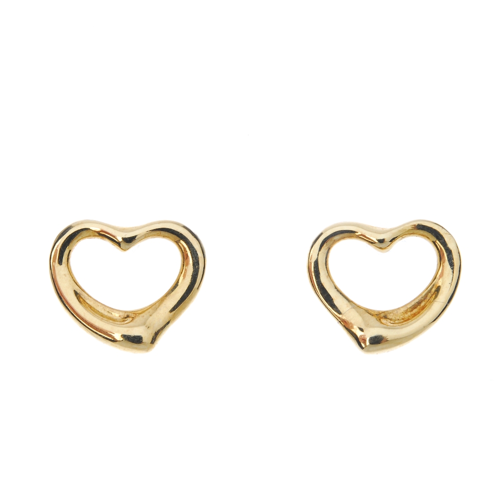 TIFFANY & CO. - a pair of 18ct gold 'open heart' earrings by Elsa Peretti for Tiffany & Co. Each